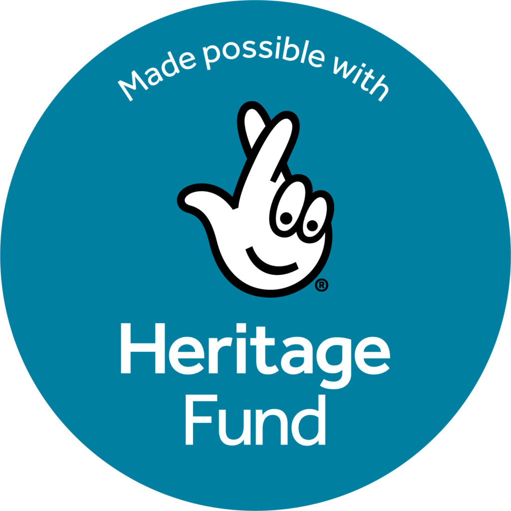 Teal circular acknowledgment stamp with the National Lottery crossed-fingers logo and the words ‘Made possible with Heritage Fund’ in white text.